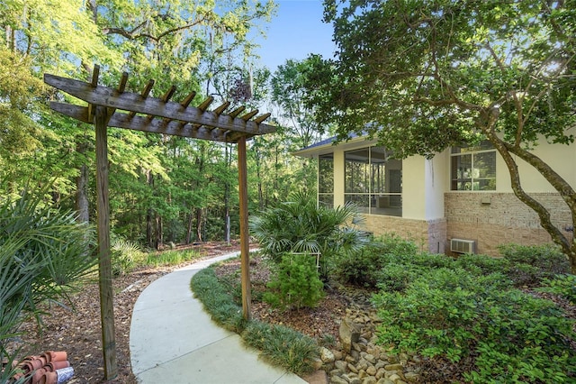 3200 NW 21st Ave, Gainesville, FL 32605 - view of yard featuring a sunroom and a pergola
