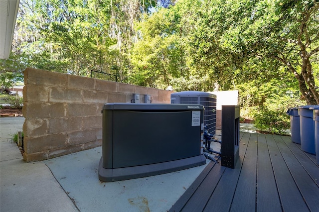 3200 NW 21st Ave, Gainesville, FL 32605 - exterior view of central AC unit and a wood stove