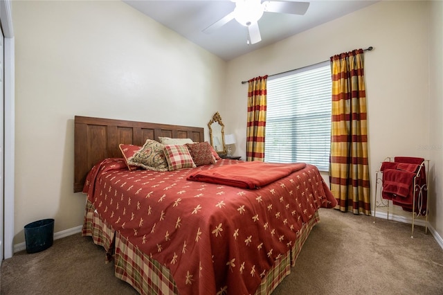 carpeted bedroom featuring ceiling fan and baseboards