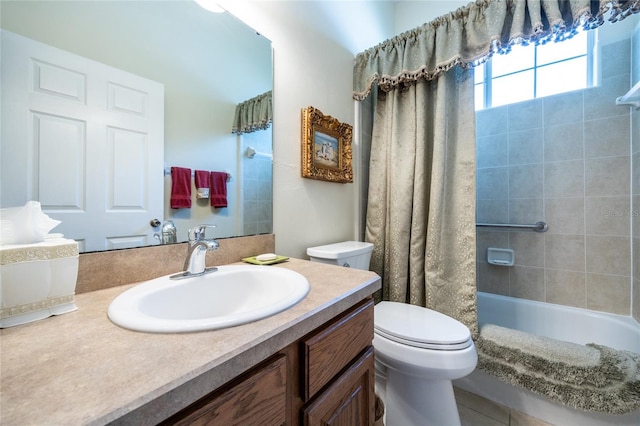 bathroom featuring shower / tub combo with curtain, toilet, and vanity