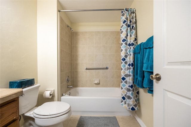 bathroom with toilet, vanity, shower / bath combo with shower curtain, and tile patterned floors
