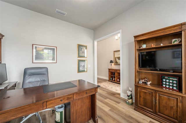 1272 NW 132nd Blvd, Newberry, FL 32669 - office space featuring light wood-type flooring and baseboards