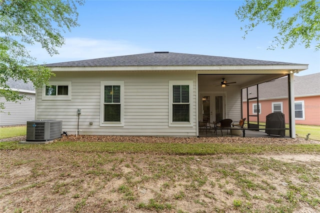 1272 NW 132nd Blvd, Newberry, FL 32669 - back of house with central AC unit, a ceiling fan, french doors, and roof with shingles