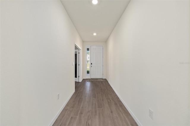 1487 NW 136th Blvd, Newberry, FL 32669 - corridor featuring recessed lighting, baseboards, and wood finished floors