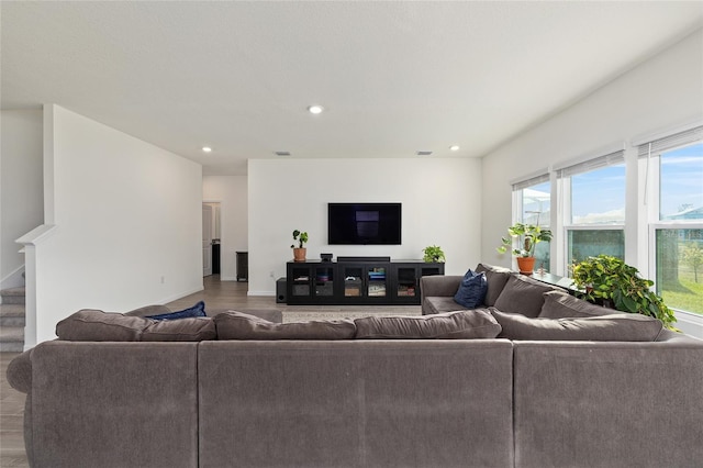 1487 NW 136th Blvd, Newberry, FL 32669 - living room featuring recessed lighting, stairway, visible vents, and wood finished floors