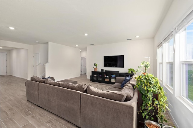 1487 NW 136th Blvd, Newberry, FL 32669 - living area featuring baseboards, visible vents, and light wood-type flooring