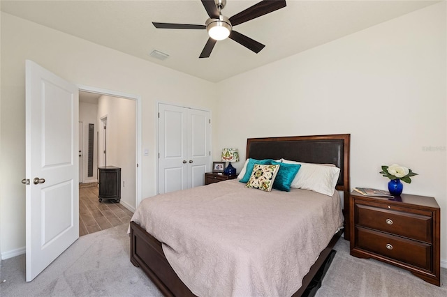 1487 NW 136th Blvd, Newberry, FL 32669 - carpeted bedroom with a closet, baseboards, ceiling fan, and visible vents