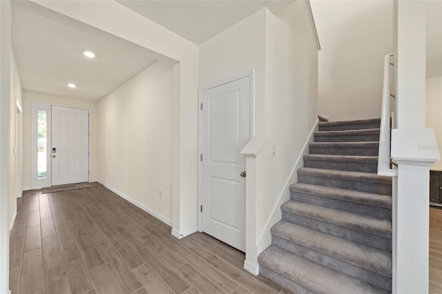 1487 NW 136th Blvd, Newberry, FL 32669 - foyer entrance with baseboards, recessed lighting, wood finished floors, and stairway