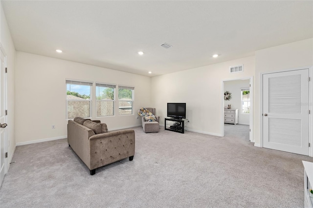 1487 NW 136th Blvd, Newberry, FL 32669 - living area featuring carpet floors, recessed lighting, and visible vents