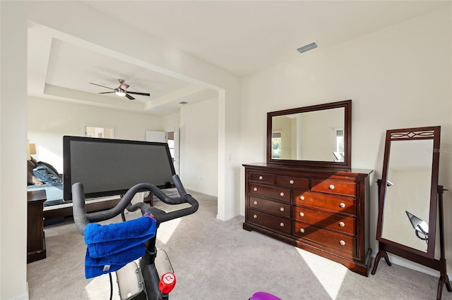 1487 NW 136th Blvd, Newberry, FL 32669 - carpeted bedroom featuring a raised ceiling, ceiling fan, and visible vents