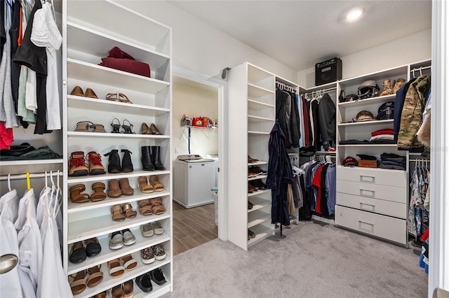 1487 NW 136th Blvd, Newberry, FL 32669 - spacious closet featuring carpet flooring and independent washer and dryer