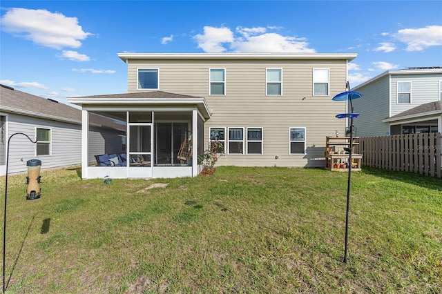1487 NW 136th Blvd, Newberry, FL 32669 - rear view of property featuring a lawn, a sunroom, and fence