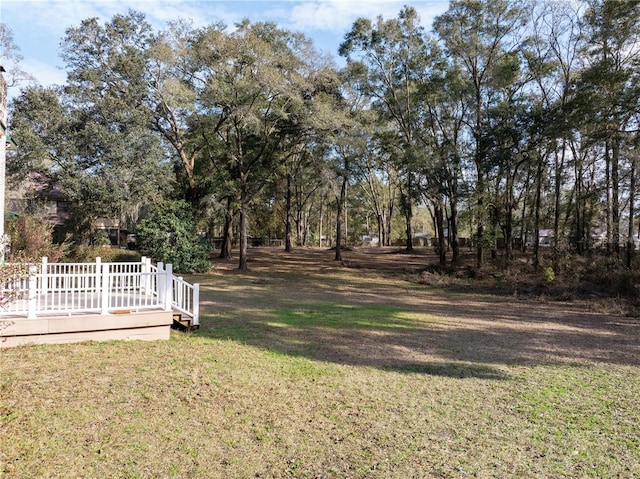 view of yard with a deck