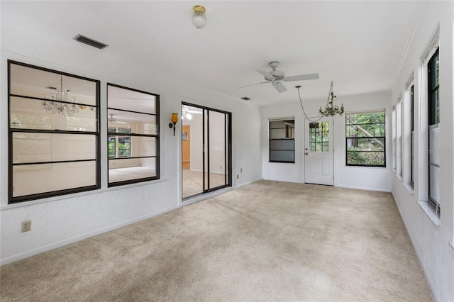 4038 NW 86th Blvd, Gainesville, FL 32653 - unfurnished sunroom with a chandelier