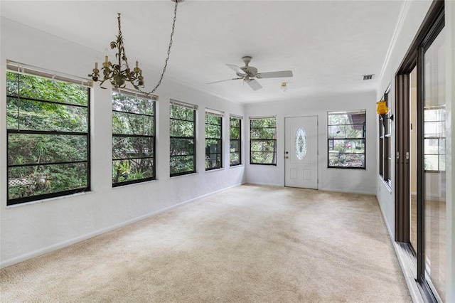 4038 NW 86th Blvd, Gainesville, FL 32653 - unfurnished sunroom with a chandelier