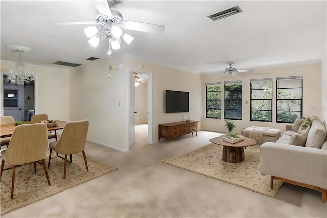 4038 NW 86th Blvd, Gainesville, FL 32653 - living room featuring a chandelier, ceiling fan, and carpet floors