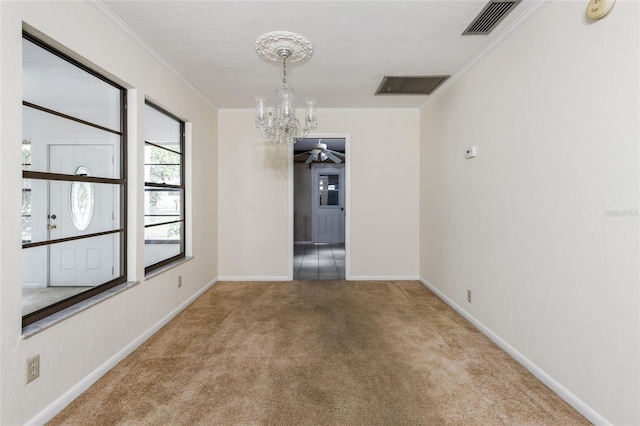 4038 NW 86th Blvd, Gainesville, FL 32653 - carpeted spare room with a chandelier, ornamental molding, and a smoke detector