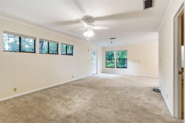 4038 NW 86th Blvd, Gainesville, FL 32653 - carpeted spare room with ceiling fan and ornamental molding