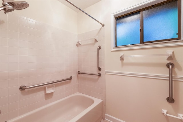 4038 NW 86th Blvd, Gainesville, FL 32653 - bathroom with washtub / shower combination and baseboards