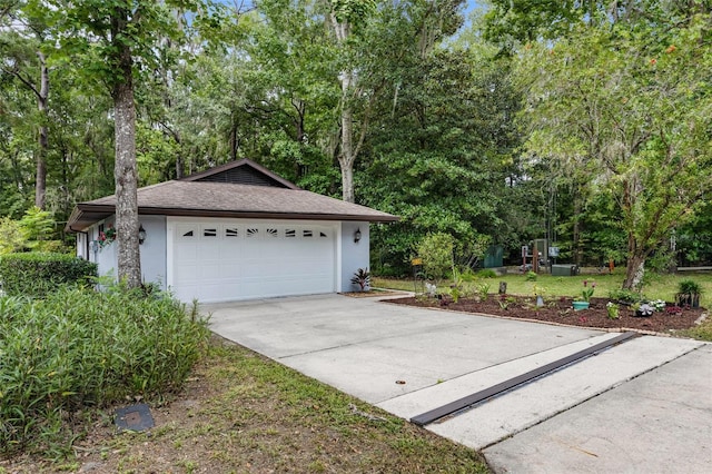 4038 NW 86th Blvd, Gainesville, FL 32653 - garage featuring concrete driveway