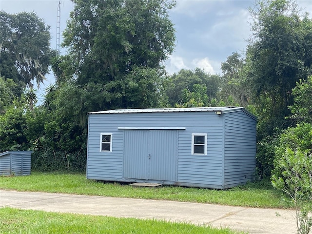 view of outbuilding with an outdoor structure