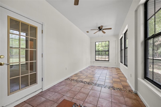 unfurnished sunroom featuring visible vents