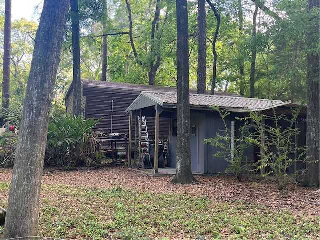 view of outbuilding with an outdoor structure