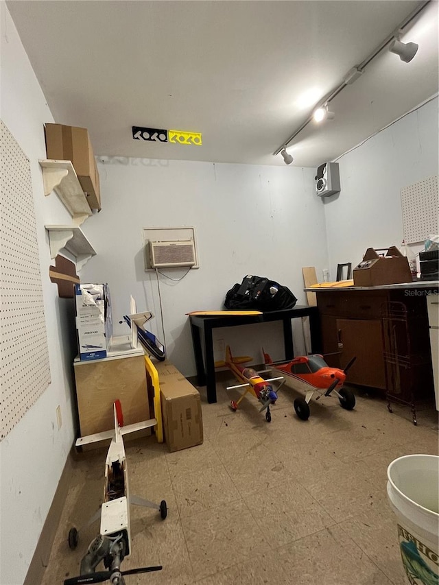 interior space featuring a wall mounted air conditioner