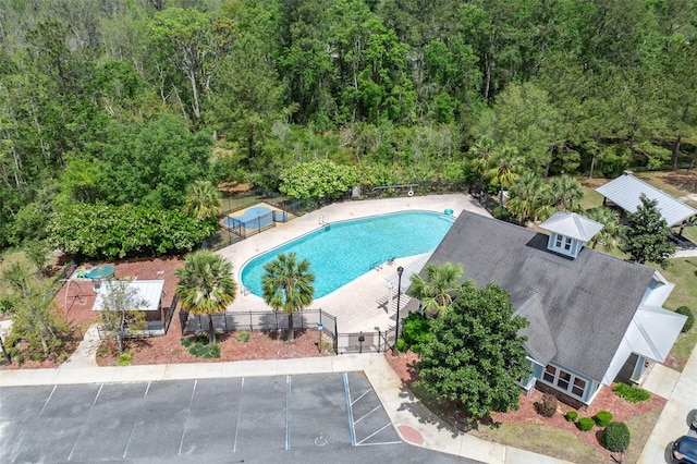 aerial view with a wooded view