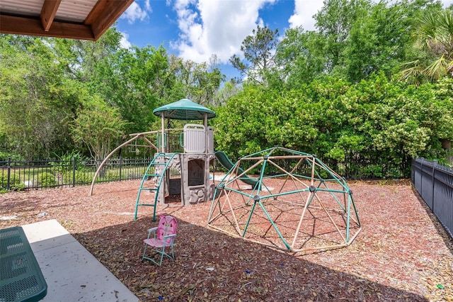 community jungle gym with fence