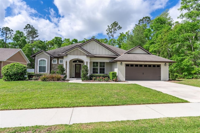 craftsman inspired home with a front lawn, a shingled roof, board and batten siding, concrete driveway, and an attached garage