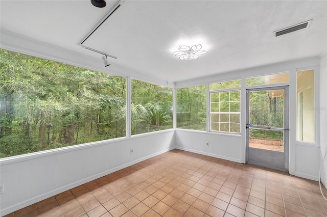 1711 NW 10th Ave, Gainesville, FL 32605 - unfurnished sunroom featuring plenty of natural light