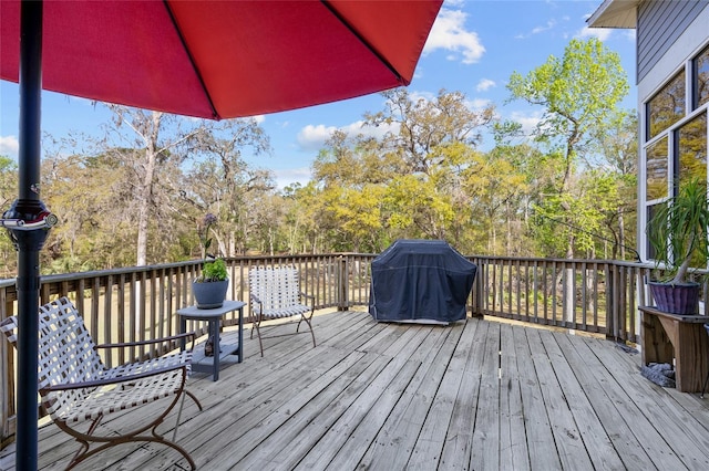 4250 NW 81st Ln, Bell, FL 32619 - wooden deck featuring a grill