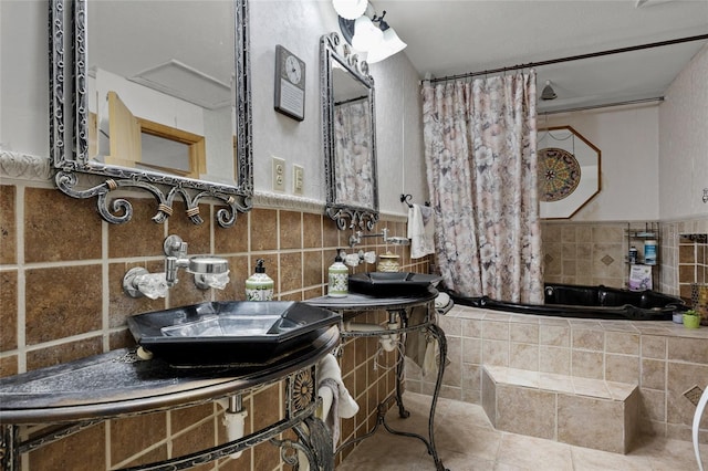 4250 NW 81st Ln, Bell, FL 32619 - full bath with a relaxing tiled tub, tile patterned flooring, and tile walls