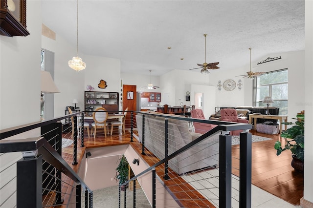 4250 NW 81st Ln, Bell, FL 32619 - interior space featuring a ceiling fan, vaulted ceiling, and a textured ceiling