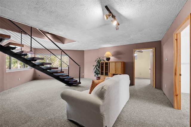 4250 NW 81st Ln, Bell, FL 32619 - living area with a textured ceiling, carpet, and stairway