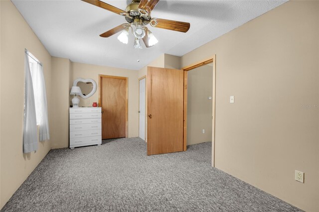 4250 NW 81st Ln, Bell, FL 32619 - unfurnished bedroom with carpet flooring and ceiling fan