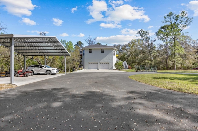 4250 NW 81st Ln, Bell, FL 32619 - view of property exterior featuring a lawn and stucco siding