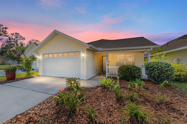 11764 NW 60th Dr, Alachua, FL 32615 - ranch-style home featuring covered porch, a garage, and driveway