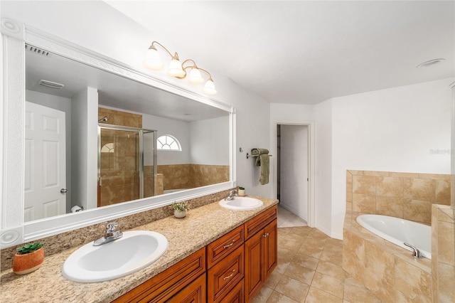 11764 NW 60th Dr, Alachua, FL 32615 - bathroom with a shower stall, a bath, double vanity, tile patterned flooring, and baseboards