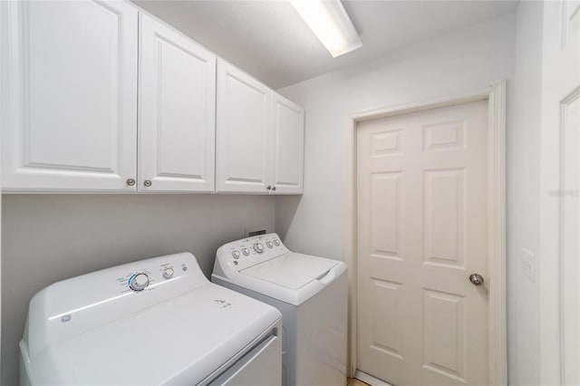 11764 NW 60th Dr, Alachua, FL 32615 - laundry area with independent washer and dryer and cabinet space