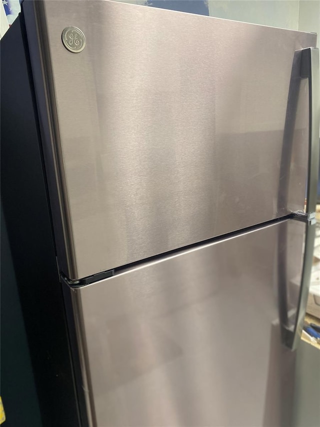 room details with freestanding refrigerator