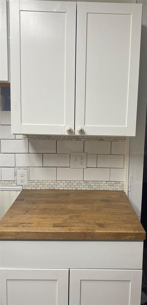 details featuring tasteful backsplash