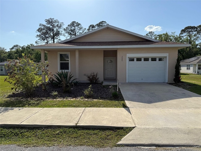 view of front of house with a garage, stucco siding, driveway, and a shingled roof