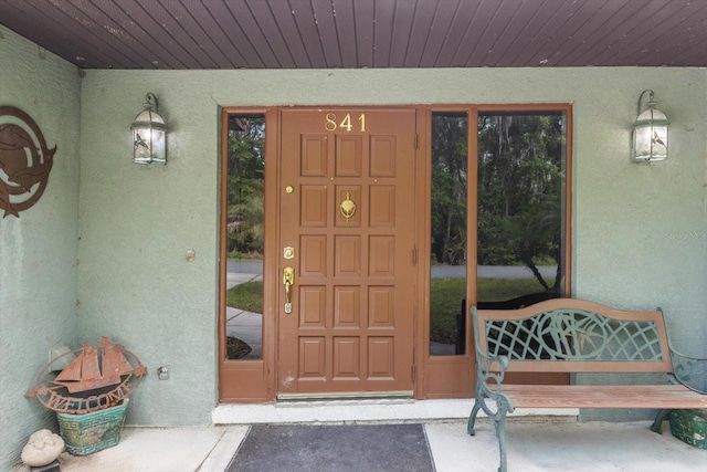 841 N Palm Springs Ter, Crystal River, FL 34429 - view of exterior entry with stucco siding