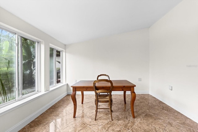 841 N Palm Springs Ter, Crystal River, FL 34429 - dining space featuring baseboards