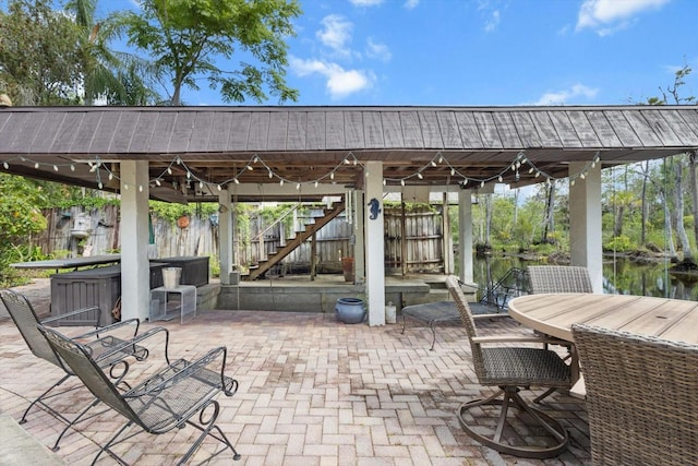 841 N Palm Springs Ter, Crystal River, FL 34429 - view of patio / terrace featuring stairs, outdoor dry bar, and fence