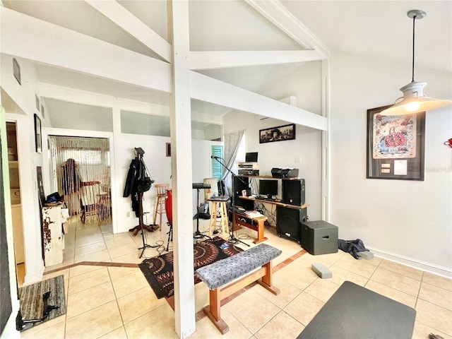 1035 NE 3rd Ave, Gainesville, FL 32601 - exercise area with tile patterned floors, baseboards, and lofted ceiling