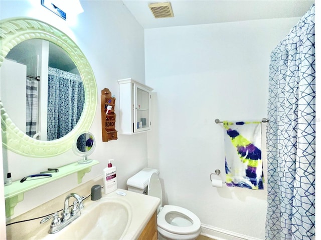 1035 NE 3rd Ave, Gainesville, FL 32601 - bathroom featuring toilet and vanity