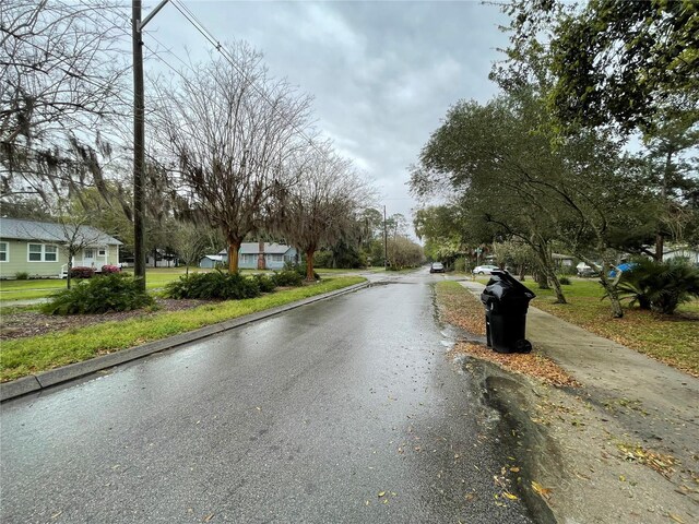 1035 NE 3rd Ave, Gainesville, FL 32601 - view of asphalt road with curbs
